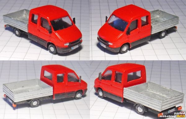 Unebenheiten am Gehäuse mit Ziehspachtel geglättet und mit 1000er Schleifpapier geschliffen, weiß grundiert und mit Revell Email Feuerrot lackiert. Alle Lackierarbeiten mit Airbrush. Gehäuse mit Tamiya-Tape abgeklebt und schwarze Schürze/Stoßstange ...