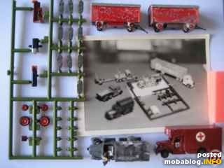 Altes Papierfoto von 1973 zeigt LKW-Umbauten aus jap.BS 1:148. Daneben im Modell ein angemalter, nicht zusammengesetzter BS eines Schleppers, dazu 2 Arnold Circuswagen, angemalt von mir (12 Stück), drei Lkw-Umbauten, ...