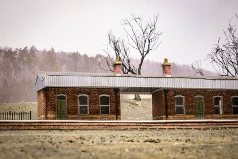 Wirkung von Geb&auml;ude, B&auml;umen und Hintergrund